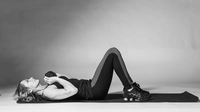 Weighted Crunches [Knees Bent] - Photo 3